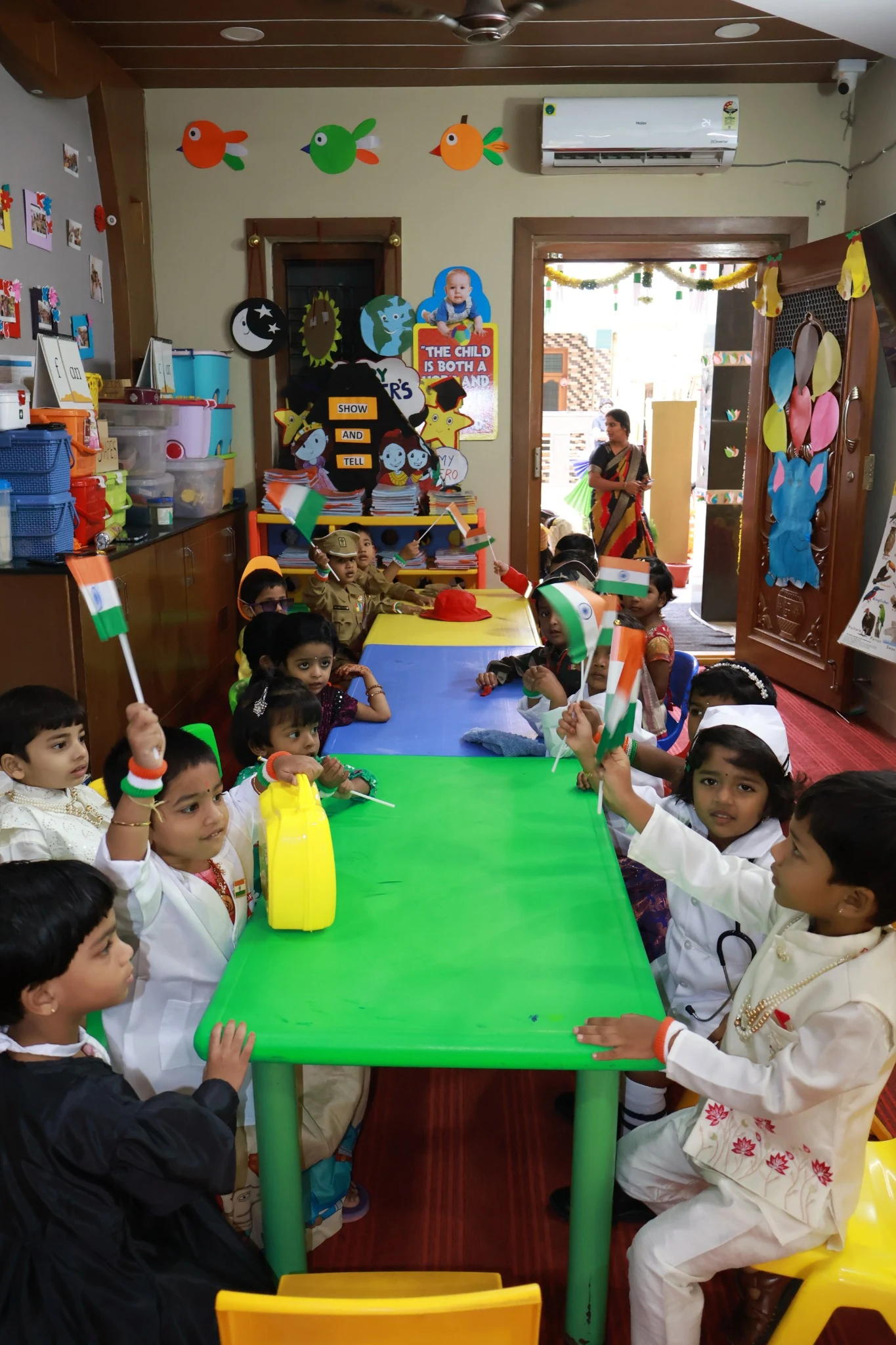 Preschool children learning with a teacher